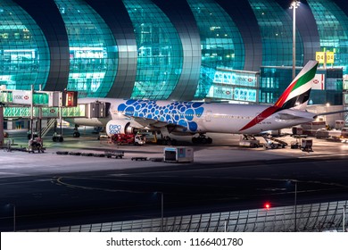 DUBAI, UAE - MAY, 2018: Emirates Airlines Boeing B777 in Expo 2020 blue color livery. DXB airport. 