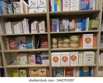 Dubai UAE May 2019 - Self Help Books Displayed At A Library, Book Store. Wide Variety Of Books For Sale.