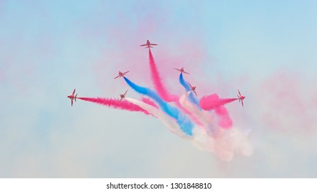 DUBAI, UAE - NOVEMBER 11, 2007: The Royal Air Force's Red Arrows Aerobatic Team Flying Over Dubai In BAE Hawk Aircraft.