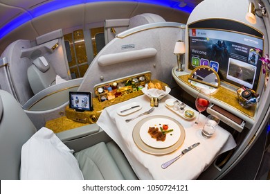 Dubai, UAE - NOVEMBER 12, 2017: Emirates first class travel. Airbus A380. Exploring the world with Emirates. Luxury first class suite. Luxury travel. Business class travel.