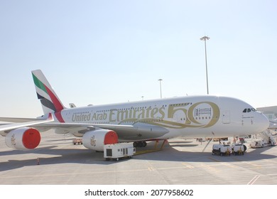 Dubai, UAE - November 14, 2021: Emirates Airline Airbus A380-800 aircraft with new livery celebrating the UAE's 50th anniversary, on static display at Dubai Airshow 2021 site at Dubai World Central. 