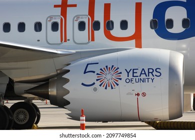 Dubai, UAE - November 14, 2021: flydubai Boeing aircraft displays at Dubai Airshow 2021 special livery celebrating the 50th anniversary (1971-2021 golden jubilee) of the United Arab Emirates nation.