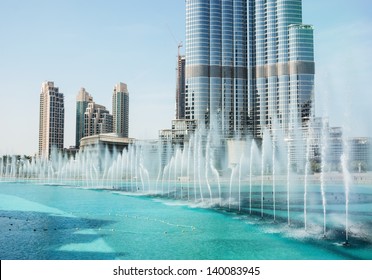 DUBAI, UAE - NOVEMBER 14: The Dancing fountains downtown and in a man-made lake in Dubai, UAE on November 14, 2012. The Dubai Dancing fountains are world's largest fountains with height 150 m.
