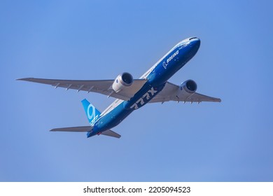 Dubai, UAE - November 15, 2021: A Boeing 777X On Climb Out With Flaps Deployed At The Dubai Airshow.