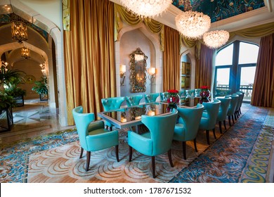 DUBAI, UAE - NOVEMBER 18, 2018: Atlantis The Palm Hotel Dubai. Royal Bridge Suite. Most Expensive Hotel Room. Exclusive Interior. Luxury Travel. Spacious Dining Room. Iconic Hotel.