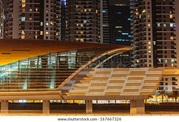 DUBAI, UAE - NOVEMBER 2: Metro\
subway station at night in Dubai. Metro as world\'s longest fully\
automated metro network (75 km) on November 2, 2013, Dubai,\
UAE.