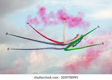 Dubai, UAE - November 21, 2019: Aerobatics Team Performing Airshow With Color Smokes. Air Show. Aerobatics Team. Display Team.