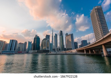 Dubai, UAE, November 25, 2020. Amazing view of Dubai skyscrapers. Business bay and Burj Khalifa view at sunset time. Dubai water canal.  - Shutterstock ID 1867922128