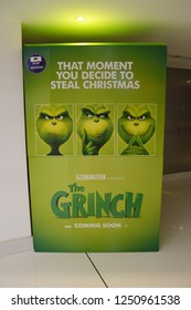 Dubai, UAE – November 27, 2018: A Standee Of A 3D Computer-animated Christmas Comedy Film The Grinch Or Dr. Seuss' The Grinch (2nd Story Of How The Grinch Stole Christmas In 2000) At The Theater.