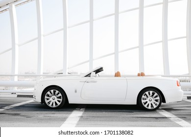 Dubai / UAE - October 10 2019: Rolls-Royce Dawn. Cabrio model. Luxury and Success. Dubai car rental. Exclusive car for your life. Leather seats, wooden parts inside. Expo2020 promo