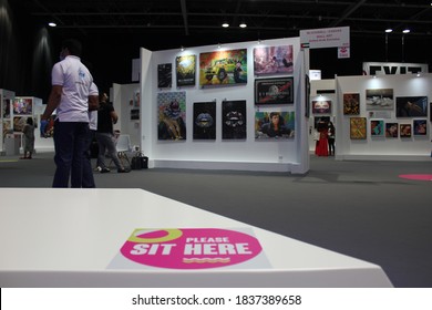 Dubai, UAE - October 10, 2020: Decal/sticker Sign Instructs Visitors To Maintain Social Distance As A Stipulated Health Precaution At 'World Art Dubai' Retail Art Fair, During The Covid-19 Pandemic.