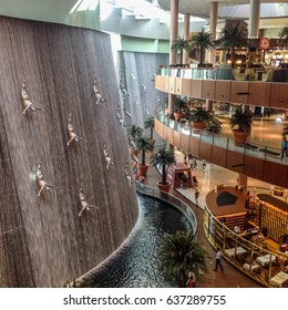 DUBAI, UAE - OCTOBER 20, 2013: Waterfall in Dubai Mall - world's largest shopping mall