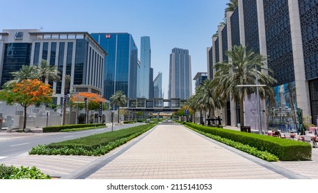 Dubai, UAE-June 2019: Downtown Dubai street scenery with a view of futuristic tall skyscrapers, city landmarks famous in the world during beautiful sunny days. Arab countries residencies.