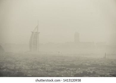 Dubai, UAE-May 9, 2019 ; The Black And White World's First Seven Stars Luxury Hotel Burj Al Arab In The Mist During Sunset.