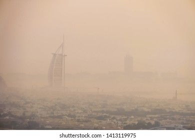 Dubai, UAE-May 9, 2019 ; The World's First Seven Stars Luxury Hotel Burj Al Arab In The Mist During Sunset.