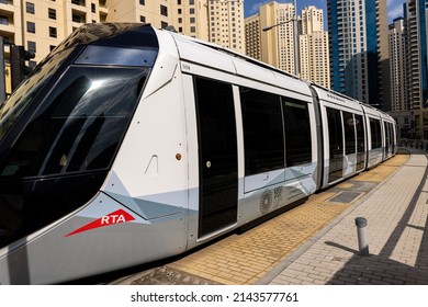 Dubai, UAEmirates - april 7 2022: Image of the modern Dubai Marina Tram operated by RTA company of Dubai with route between Marina Jumeirah Towers and Al Safouh station.
