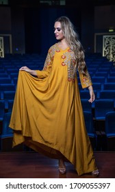 Dubai, United Arab Emirates 02/17/2020 : Beautiful Fashion Model Wearing An Arabic Dress And Posing For Camera In A Theater Studio In Studio City, Dubai