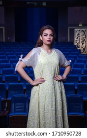 Dubai, United Arab Emirates 02/17/2020 : Beautiful Fashion Model Wearing An Arabic Dress And Posing For Camera In A Theater Studio In Studio City, Dubai