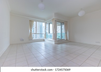 Dubai, United Arab Emirates 03/10/2020 :
Empty Hall With White Tiles Flooring In An Apartment In Al Hikmah Residences In Dubai Marina