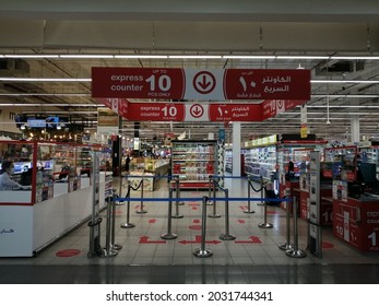 Dubai, United Arab Emirates - August 27, 2021: Express Checkout Counters For Customers At A Carrefour Supermarket Located In A Shopping Mall.