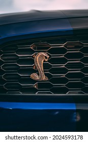 DUBAI, UNITED ARAB EMIRATES - Mar 10, 2021: A Vertical Shot Of The Logo Of Ford Mustang Cobra Edition