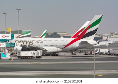 DUBAI, UNITED ARAB EMIRATES - Mar 07, 2022: An Emirates Airlines Airbus 380 In Merchant Logo At China Southen With A Blue Sky