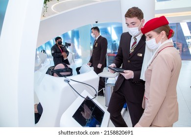 DUBAI, UNITED ARAB EMIRATES - Mar 29, 2022: Male And Female Hostess Airline With Traditional Clothes