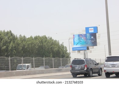 Dubai, United Arab Emirates - March 6, 2022: Large Outdoor Digital Advertising Billboard Displays A Marketing Campaign In Dubai City Where It Is Viewed Daily By Thousands Of Highway Motorists.