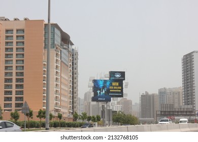 Dubai, United Arab Emirates - March 6, 2022: Large Outdoor Digital Advertising Billboard Displays A Marketing Campaign In Dubai City Where It Is Viewed Daily By Thousands Of Highway Motorists.