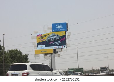 Dubai, United Arab Emirates - March 6, 2022: Large Outdoor Digital Advertising Billboard Displays A Marketing Campaign In Dubai City Where It Is Viewed Daily By Thousands Of Highway Motorists.