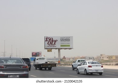 Dubai, United Arab Emirates - March 7, 2022: Large Outdoor Advertising Display (unipole Billboard) Located On A Major Highway In Dubai City. Out Of Home Advertising Concept.