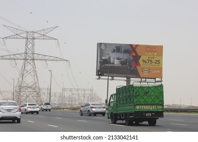 Dubai, United Arab Emirates - March 7, 2022: Large Outdoor Advertising Display (unipole Billboard) Located On A Major Highway In Dubai City. Out Of Home Advertising Concept.