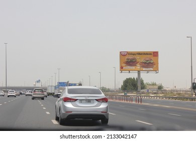 Dubai, United Arab Emirates - March 7, 2022: Large Outdoor Advertising Display (unipole Billboard) Located On A Major Highway In Dubai City. Out Of Home Advertising Concept.