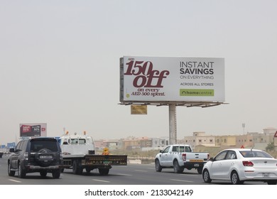 Dubai, United Arab Emirates - March 7, 2022: Large Outdoor Advertising Display (unipole Billboard) Located On A Major Highway In Dubai City. Out Of Home Advertising Concept.