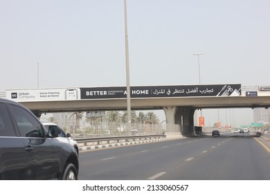 Dubai, United Arab Emirates - March 7, 2022: Outdoor Advertising Panel (horizontal Banner) Over A Highway In Dubai City. Out Of Home Advertising Concept.