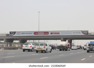 Dubai, United Arab Emirates - March 7, 2022: Outdoor Advertising Panel (horizontal Banner) Over A Highway In Dubai City. Out Of Home Advertising Concept.