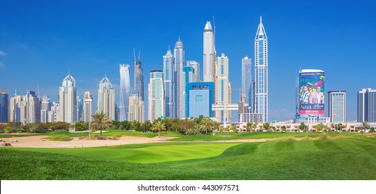 DUBAI, UNITED ARAB EMIRATES - MARCH 2, 2016: Luxury Skyscrapers In Dubai Marina On Jumeirah Beach, Golf Club And The Nature Around,Dubai,United Arab Emirates