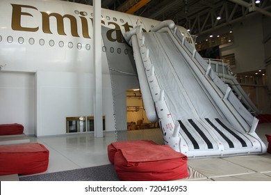 DUBAI, UNITED ARAB EMIRATES – MARCH 2 2015: An Unidentified Instructor At Emirates' Cabin Crew Training Centre In Dubai Prepares To Welcome Cabin Crew Members For Aircraft Evacuation Training.