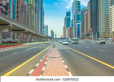 Dubai, United Arab Emirates - May 1, 2013: traffic on Sheikh Zayed Road, highway E 11, which runs through Dubai and is home to the most modern skyscrapers located in the Dubai Downtown district.