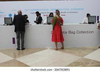 Dubai, United Arab Emirates - October 25, 2021: Delegates Collect Their Complimentary Conference Bags At The 72nd International Astronautical Congress.