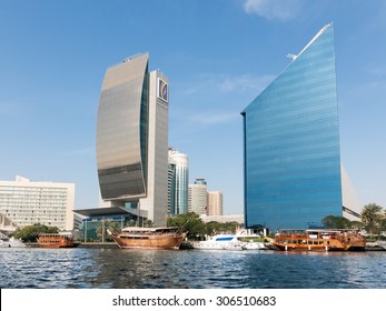 DUBAI, UNITED ARAB EMIRATES (UAE) - JAN 26, 2014: Buildings Of The National Bank Of Dubai And The Chamber Of Commerce, DCCI, In Rigga Al Buteen Central Business District Deira, The Creek