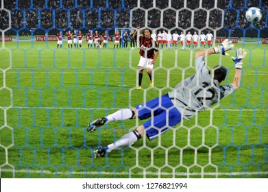 DUBAI, UNITED ARAB EMIRATES-JANUARY 06, 2008: AC Milan's Brazilian Star Ronaldinho Scores A Penalty Kick During The Match AC Milan Vs Hamburg , In Dubai.