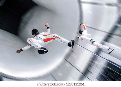 Dubai Wind Tunnel Aerodynamics Skydiving. Flying People In Wind Tunnel . Indoor Skydiving