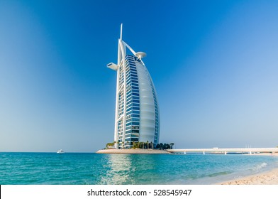 DUBAI,UAE-JAN 22: View of the luxury beach of Dubai and Burj al arab on the 22th of january 2010, in Dubai,Uae.The Bur is the most exclusive hotel of the world, and seven star 2010 in  Dubai