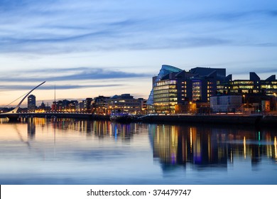 Dublin City Center During Sunset With Samuel Beckett Bridge And River Liffey