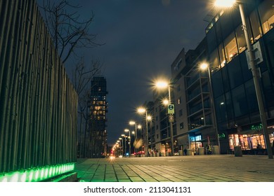 Dublin, Ireland - 21.01.2022: Grand Canal Quay Illuminated At Night. Low Angle Shot.