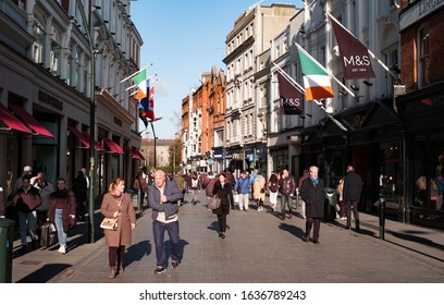 Dublin, Ireland - 29th January 2020: Shoppers and tourists walking on  Grafton Street ,  Grafton Street is one of the two principal pedestrian shopping streets in Dublin city centre
