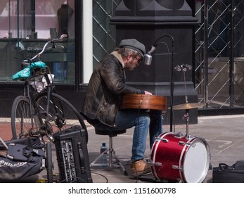 Dublin, Ireland - April 10th 2016: Busker Singing And Playing Guitar On Grafton Street, Dublin