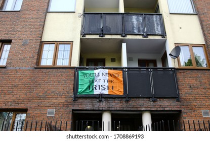 Dublin, Ireland - April 19, 2020: A 'You'll Never Beat The Irish' Flag Hanging From A Balcony In The North Inner City During Covid-19 Restrictions.