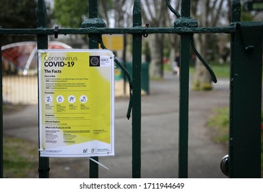 Dublin, Ireland - April 19, 2020: A Covid-19 Public Health Notice On The Railings Of A Playground, Closed Due To Lockdown Restrictions.